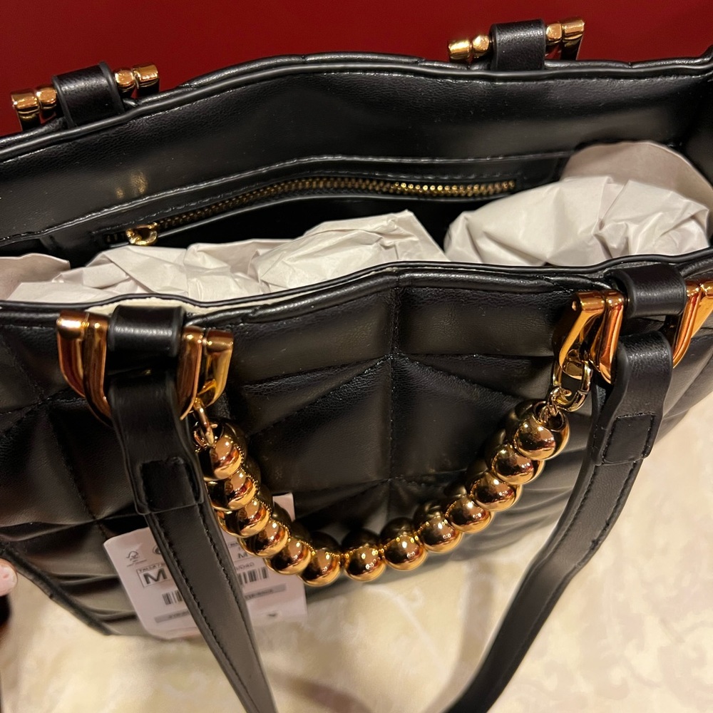 Black bag 🖤 with gold tone hardware